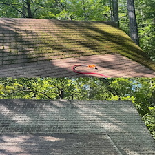 Eliminating-Heavy-Moss-Growth-from-a-Detached-Barn-Roof-Roof-Washing-in-Wolfeboro-NH 1