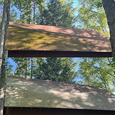 Eliminating-Heavy-Moss-Growth-from-a-Detached-Barn-Roof-Roof-Washing-in-Wolfeboro-NH 0