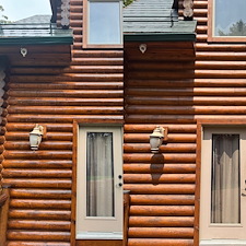 Preparing-a-Log-Home-for-Fresh-Stain-House-Washing-in-Wolfeboro-NH 0